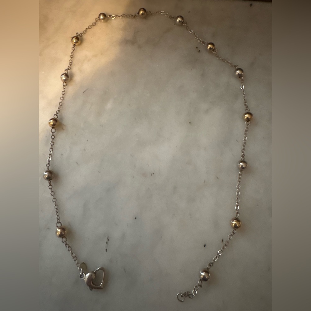 EUC sterling silver necklace about 16 inches long